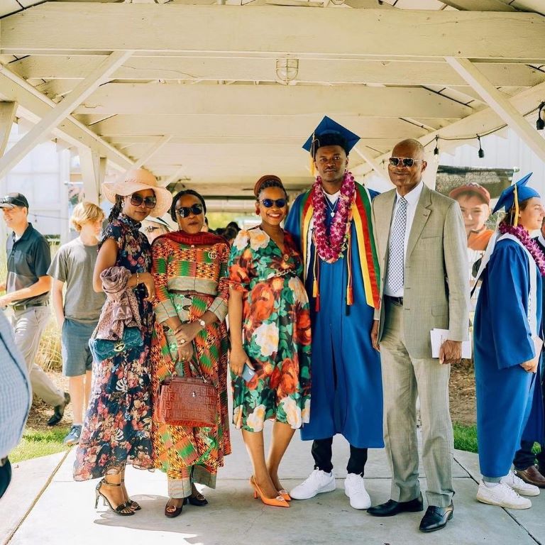 Yves Missi with his parents at graduation