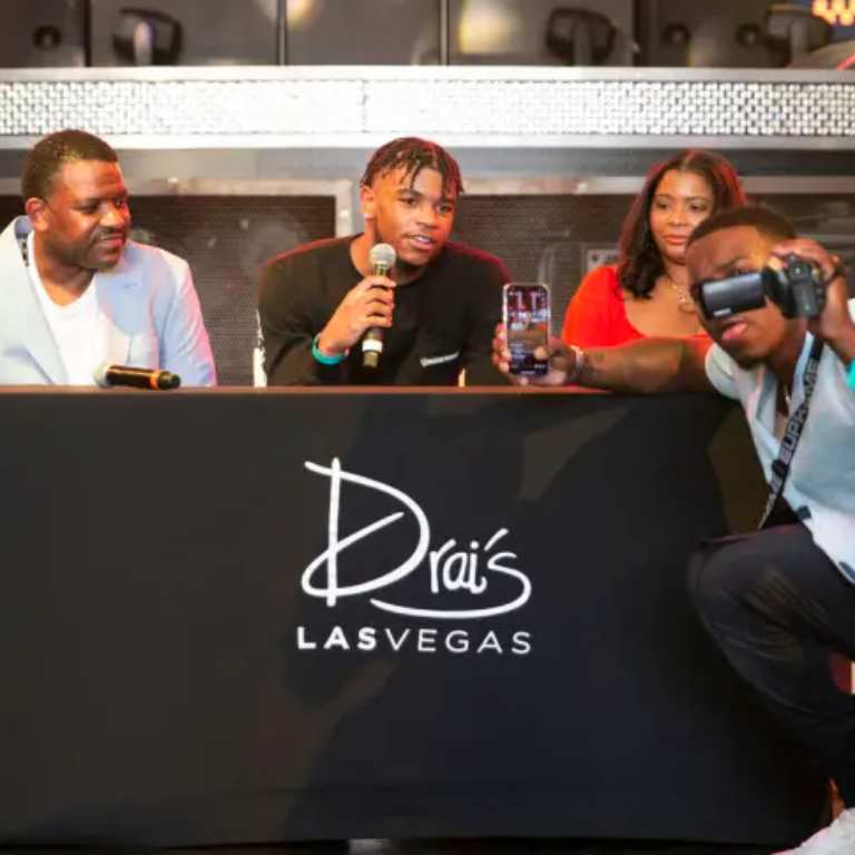 Jaden Hardy With his parents during a an event for announcing his move to the NBA G League.