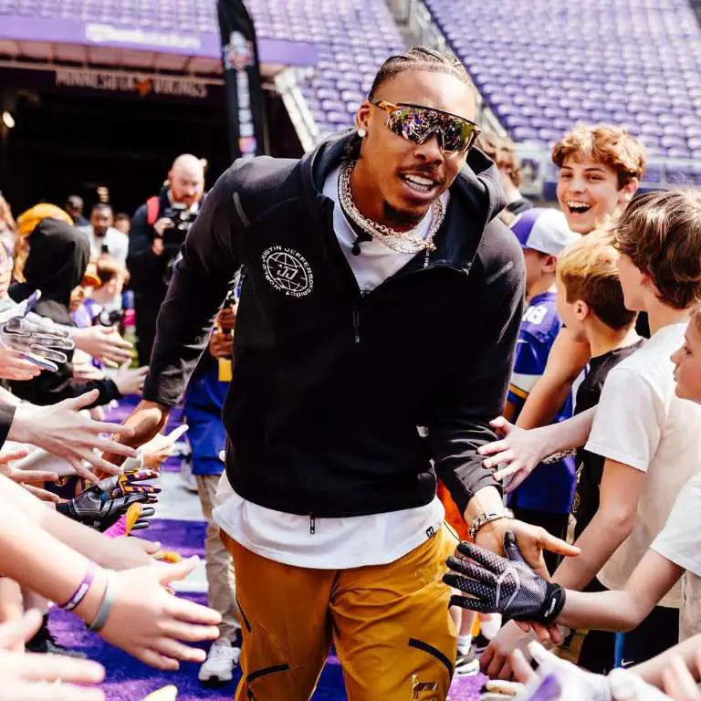 Justin Jefferson meeting his fans at U.S. Bank Stadium.