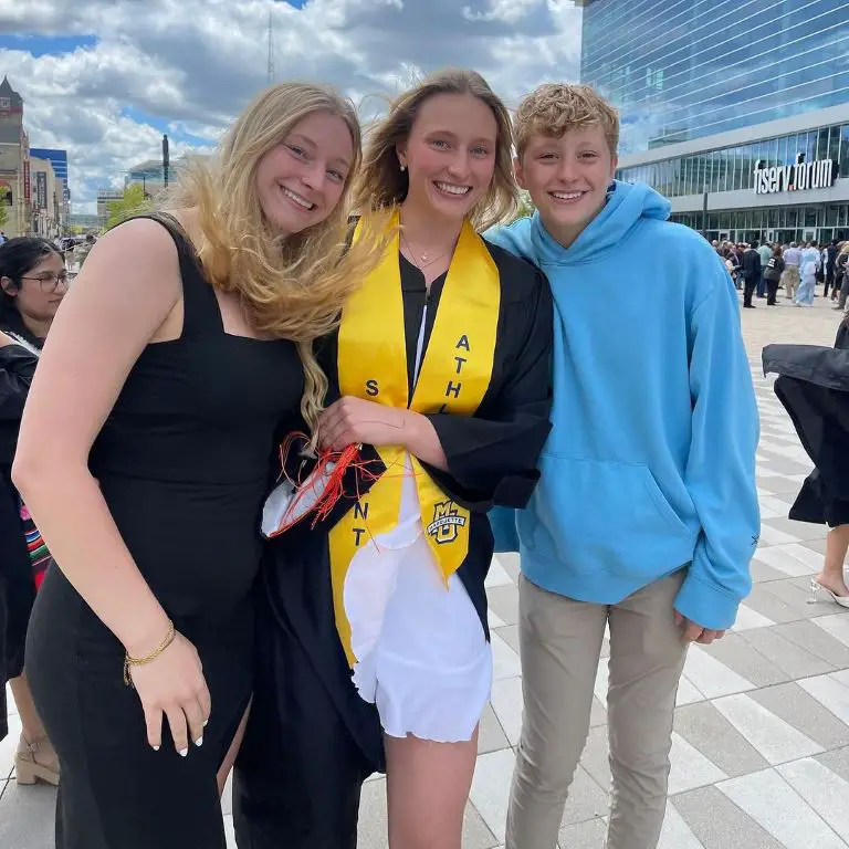 Liza Karlen with her siblings during her graduation