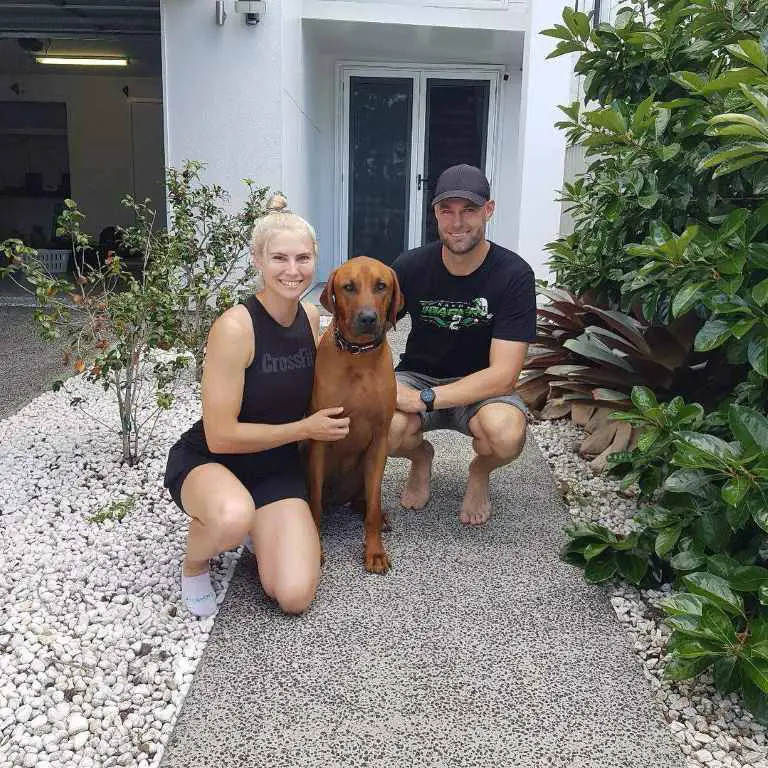 Shane van Gisbergen and Jessica Dane with their pet dog.