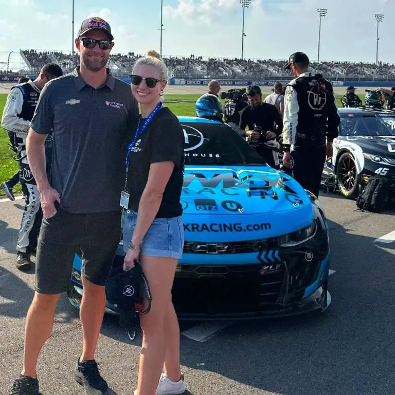 Shane van Gisbergen with his girlfriend Jessie on the racing track.