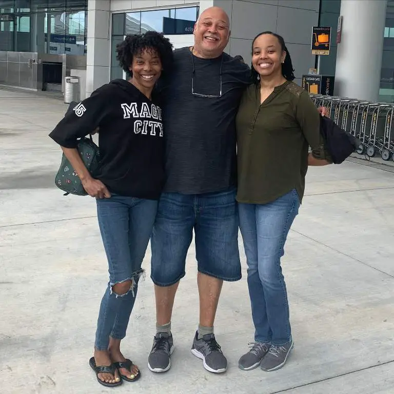 Erica Ash and her father, Donald Ash with sister, Adrienne Ash spending time with their father in NOLA.