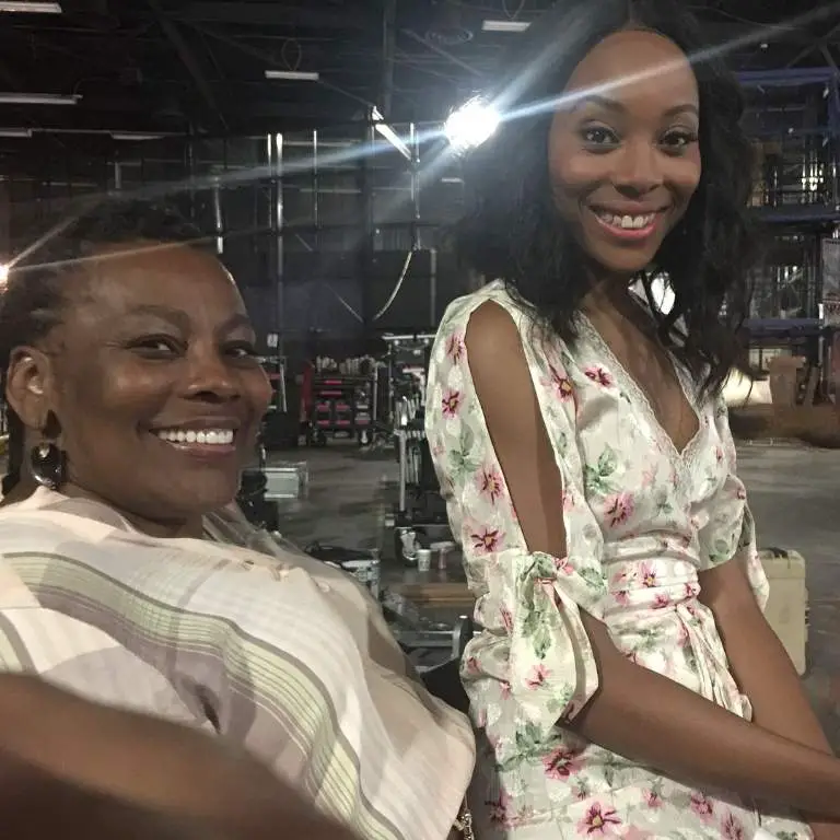 Erica Ash with her mother, Diann Ash watching the movie Uncle Drew on the set.