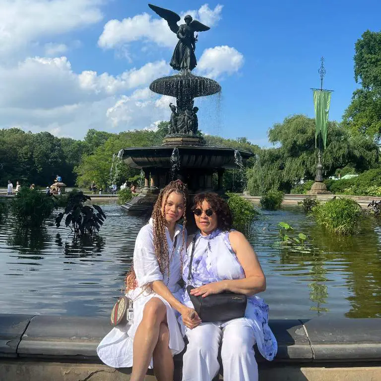 Andra Day with her mother, Delia spending a day out in a matching white dress.