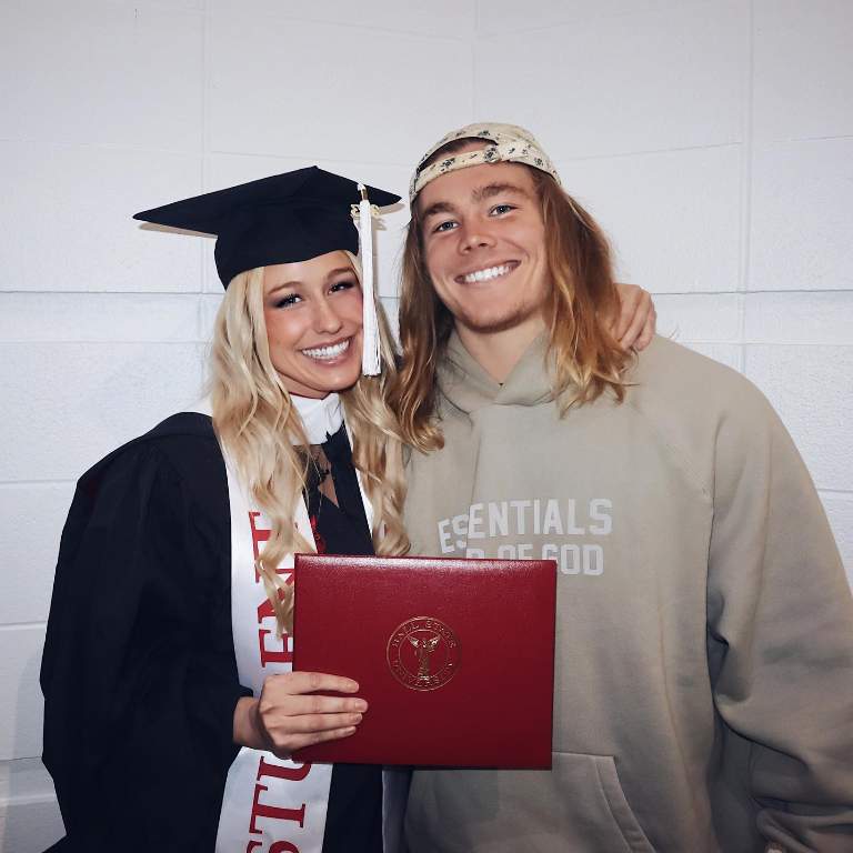 Carson Steele supporting his alleged girlfriend, Addie Halverson during her graduation