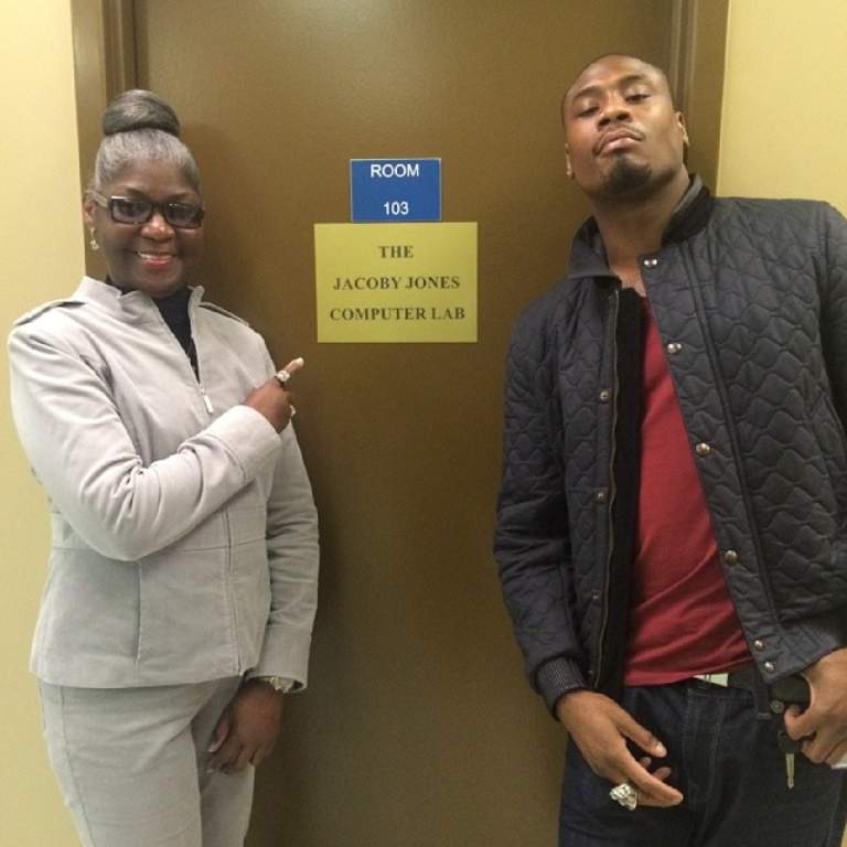 Jacoby Jones posing with his mother, Emily London visiting Lance College for a picture