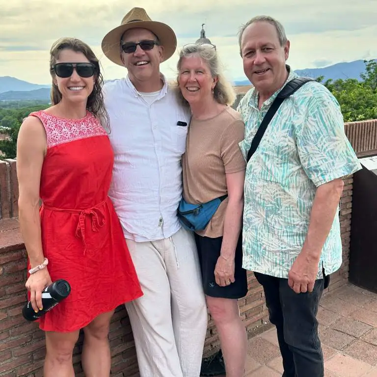 Kristen Faulkner with her parents and uncle taking pictures in