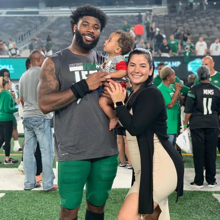 La'Mical Perine with his wife and son