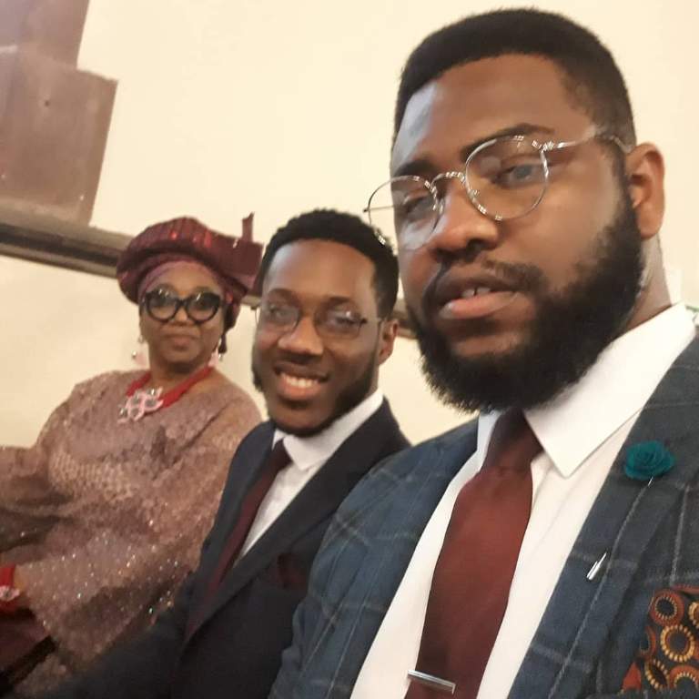 Tobi Bamtefa with his mother, Marcia and his brother, Dayo posing for a picture during a family function