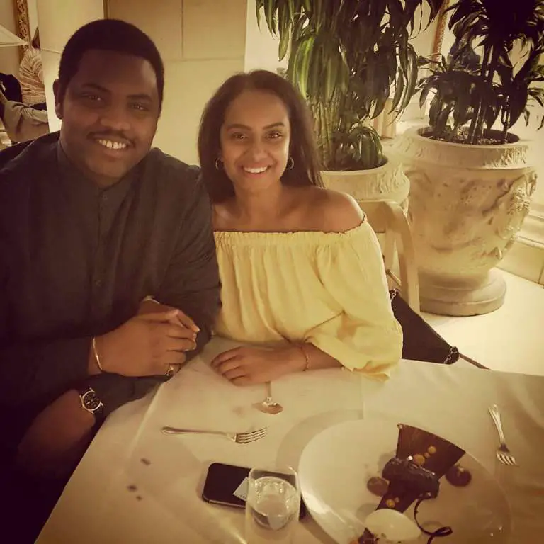 Tobi Bamtefa with his wife, Shika Bamtefa posing for a picture during a romantic dinner