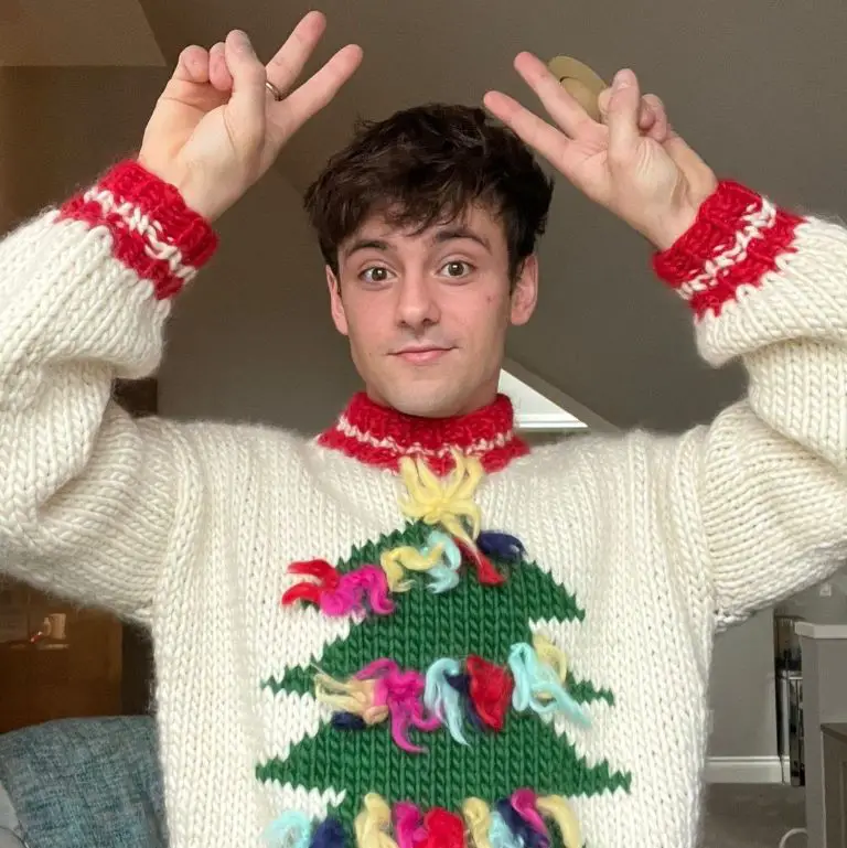 Tom Daley posing for a picture at his home in Christmas.