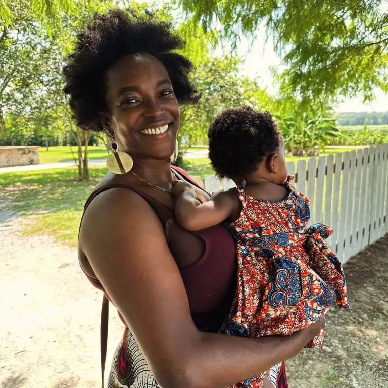 Wunmi Mosaku with her child