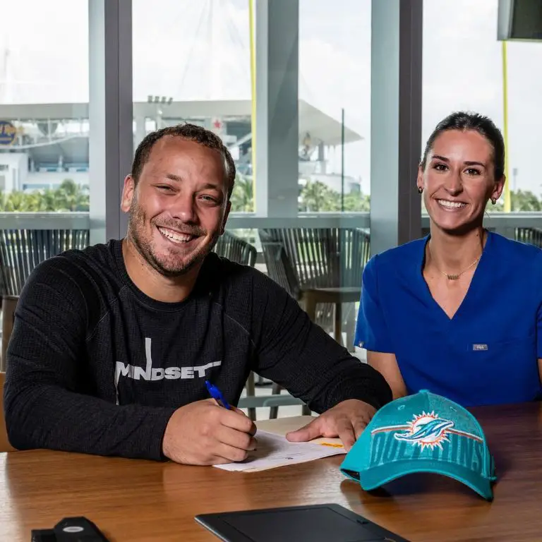 Alec Ingold Signing The Extended Contract With Miami Dolphins