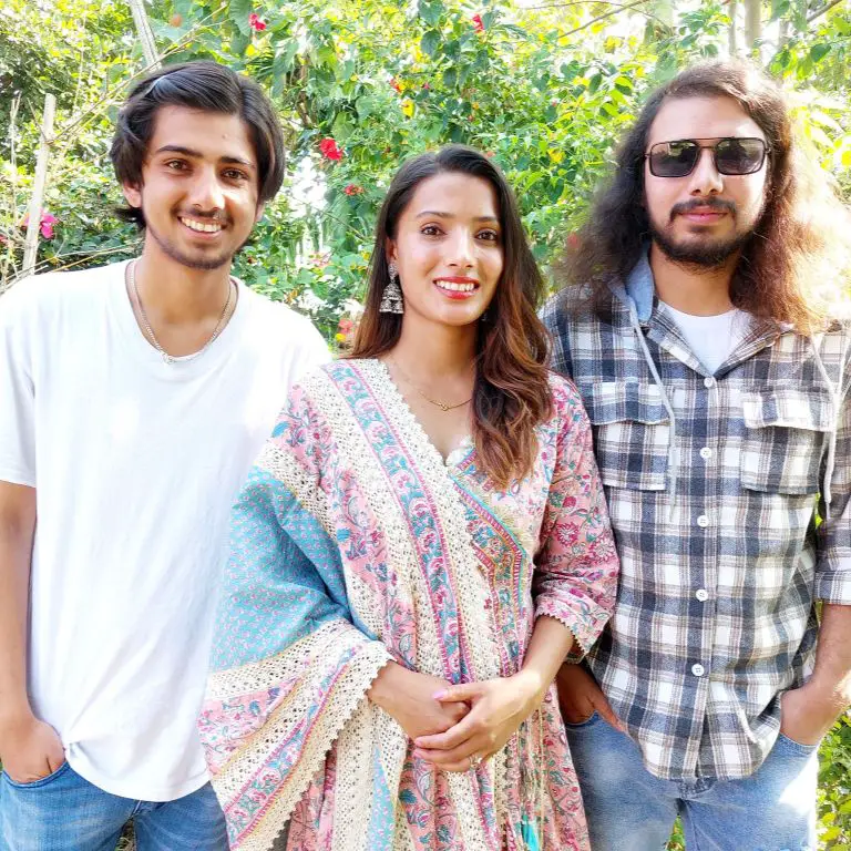 Bhara Mani with his brother and sister