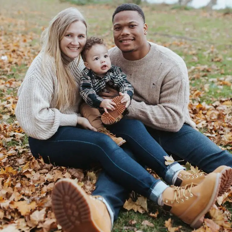 David Montgomery and his partner Tatum Causey with their son David Montgomery Jr.