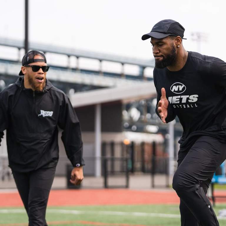 Haason Reddick training with his new squad, Jets preparing for upcoming matches.