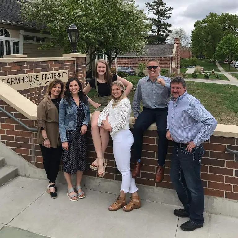 Jenna Purdy with her parents and siblings showing supporting for her brother in his graduation