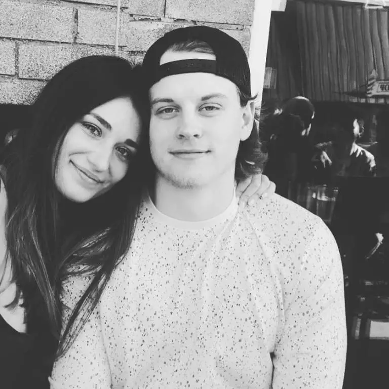 Joe Burrow with his Girlfriend, Olivia posing for a selfie in front of his house.