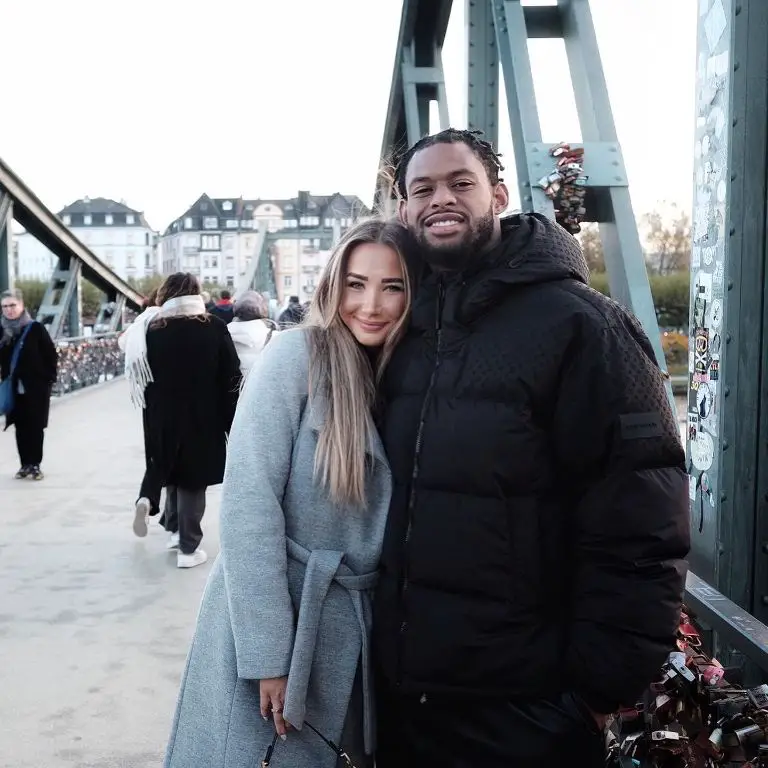 NFL wide receiver JuJu Smith-Schuster posing with his girlfriend, Laura