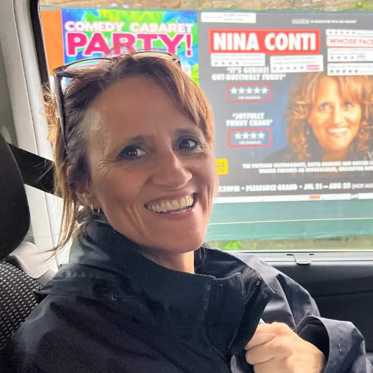 Nina Conti posing for a picture while travelling for her Stand-up tour