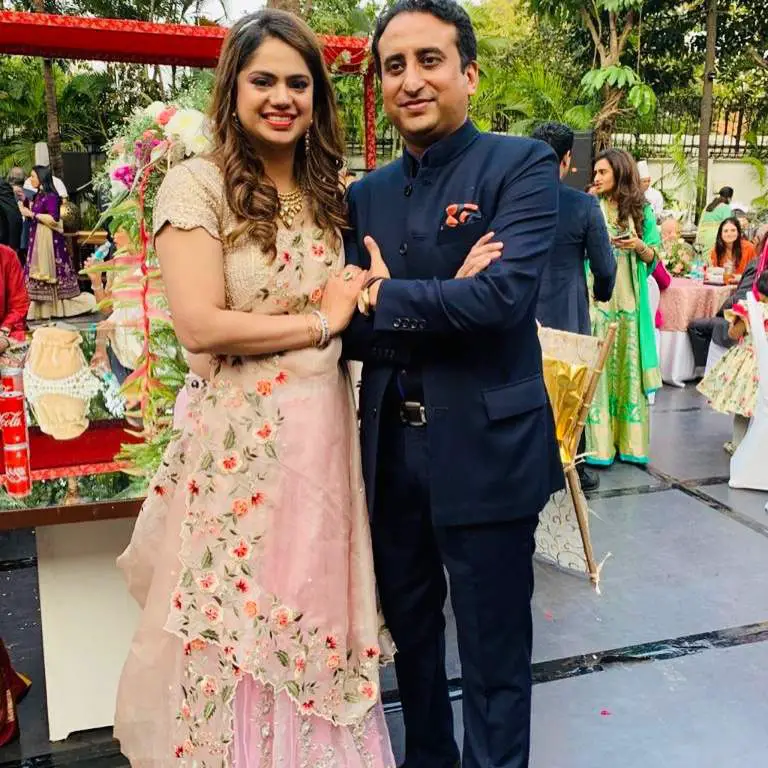 Rahul Chaudhary photographed with his wife, Surabhi attending a family event