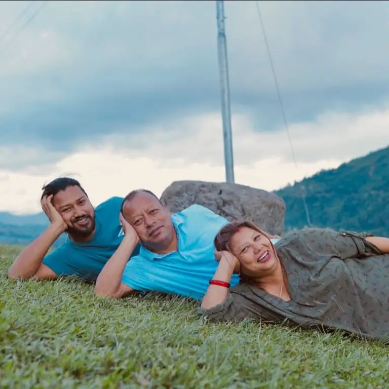 Sisan Baniya enjoying family time with his his father, Shyam Raj Baniya, and his mother, Sushila Baniya.