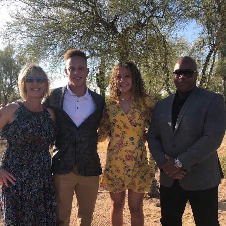 Spencer Rattler with his parents and sister on a family event