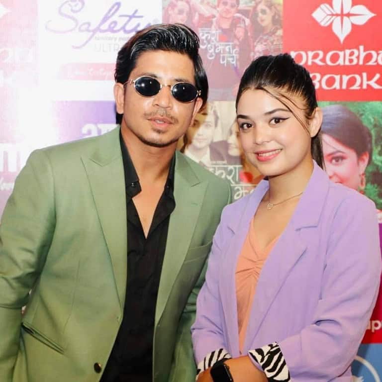 Samikshya Adhikari with another Nepali singer Prakash Saput.