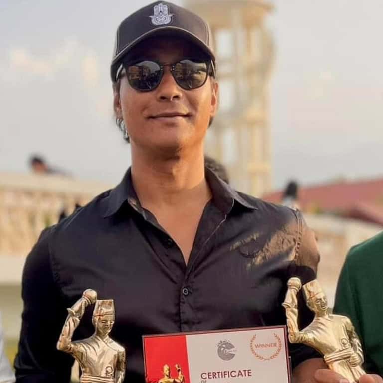 Saugat Malla wins an award.