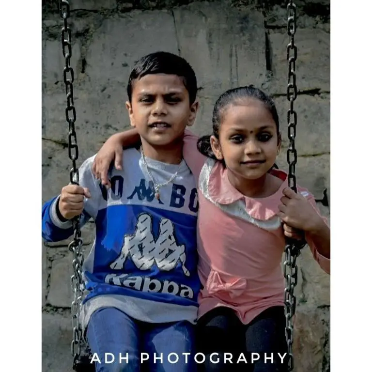 Adhikari with her older brother during her childhood days