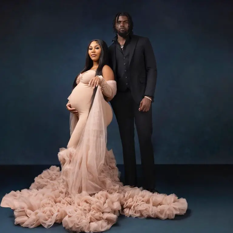 Huntley and his baby mama, Camille, posed for picture at their baby shower 