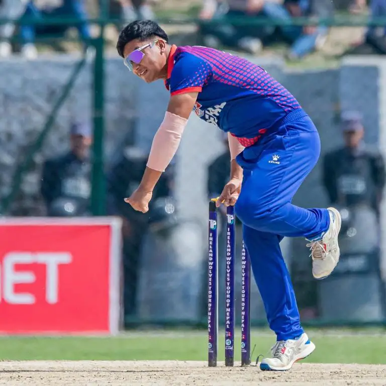 Kushal Malla bowling against Ireland Wolves at Tribhuvan University International Cricket Ground in March, 2024.