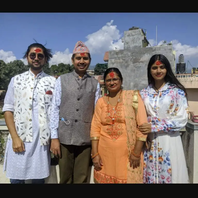 Monica Adhikari with her parents and older brother during Dashain festival