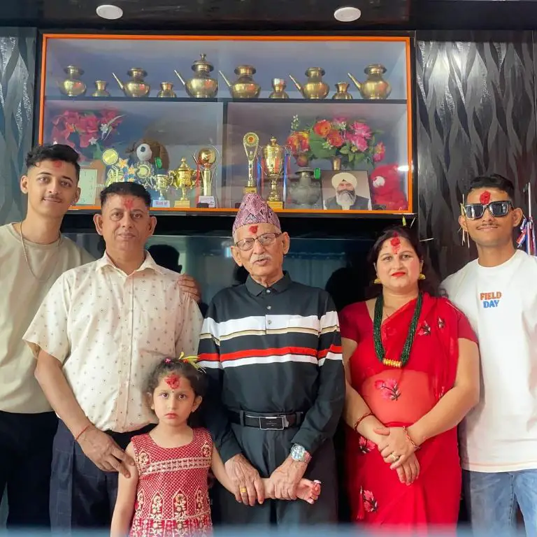 Rijan Dhakal celebrating Dashain 2080 with his family in his hometown Hetauda.