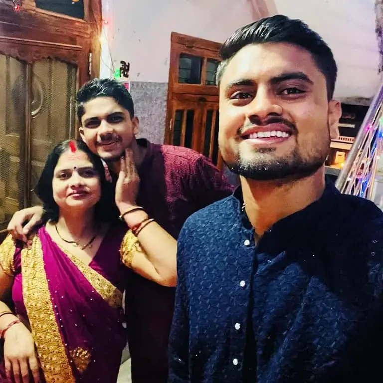 Gulsan Jha with his mother and brother