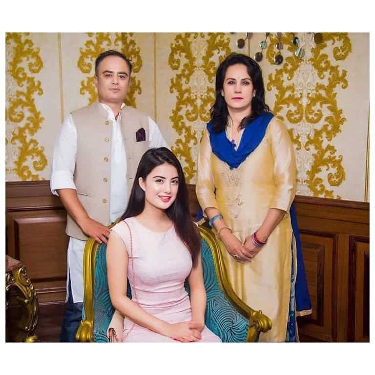 Niti Shah with her parents.