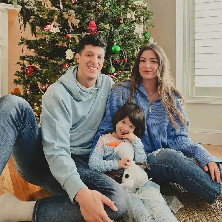 Basketball player Simone Fontecchio celebrating Christmas with his wife Rosa Tangerini and daughter Named Bianca.