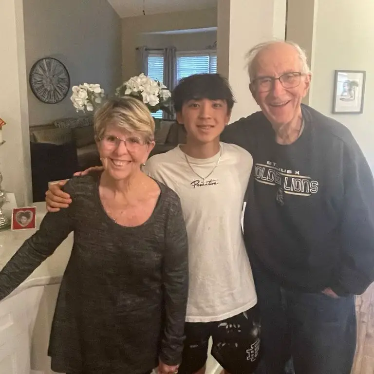 Katie's adoptive parents, John and Judy Feltcher, with her son, Max