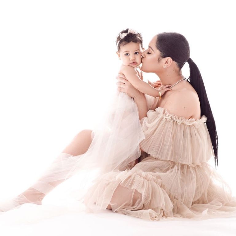 Payton's partner, Jessica Victoria, and his daughter during a photo session.