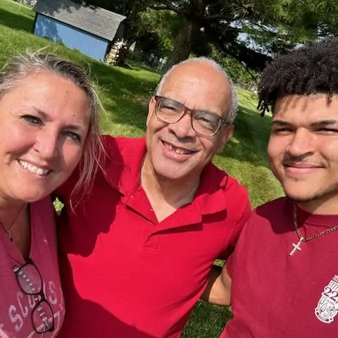 NFL player Issac with his father Mario and his mother Jennifer.